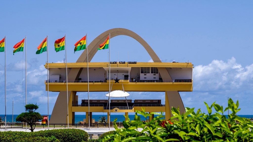 A monument and flags in Accra